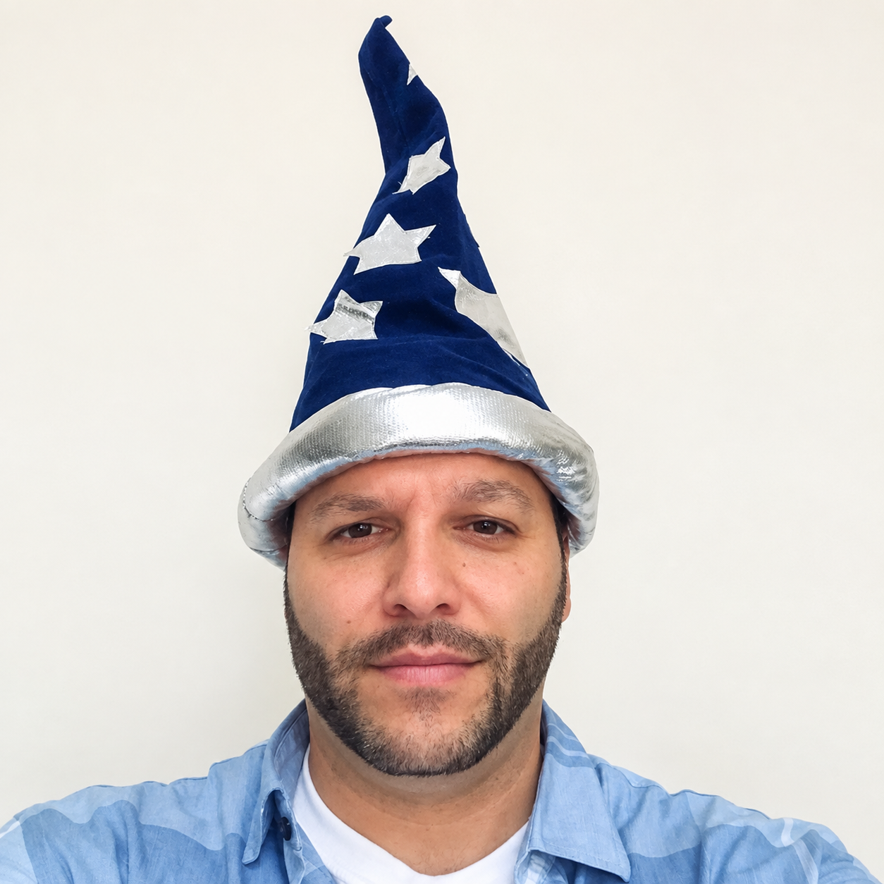Vinny Madera wearing a blue wizard hat